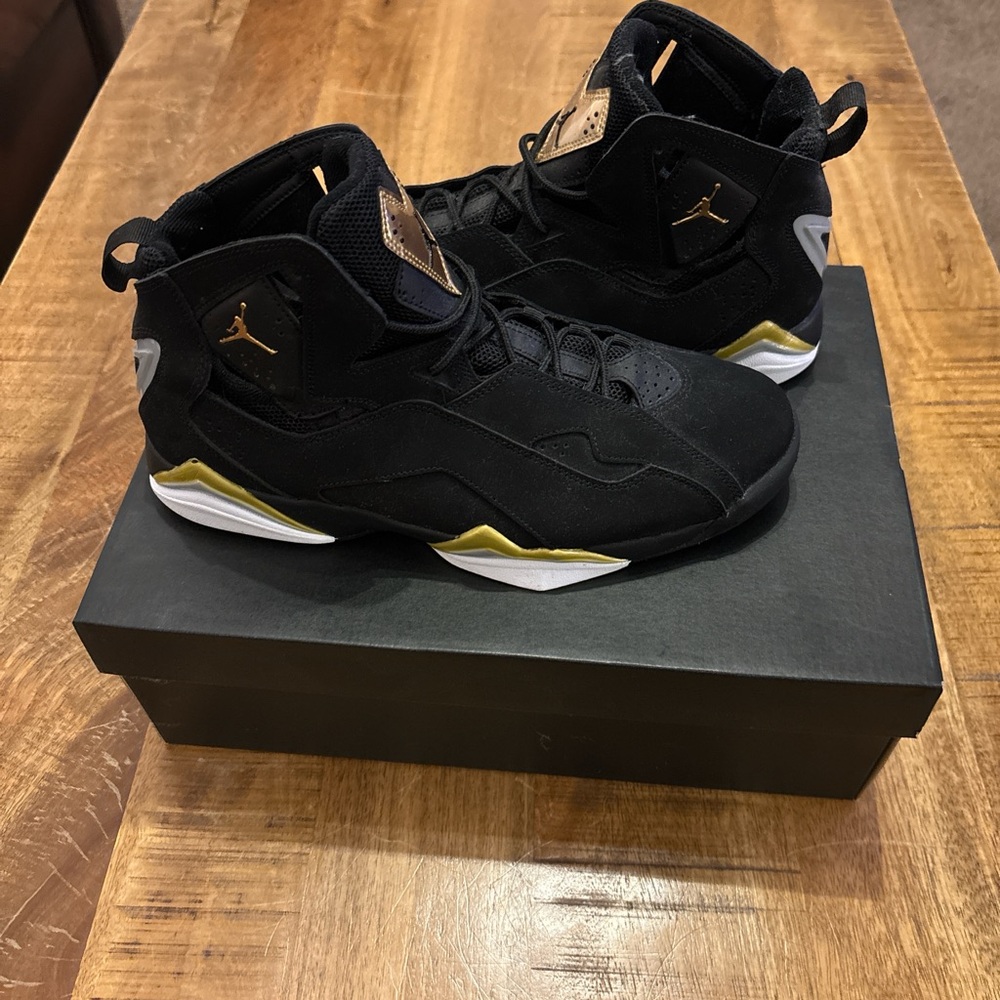 Black and Gold Air Jordan Sneakers